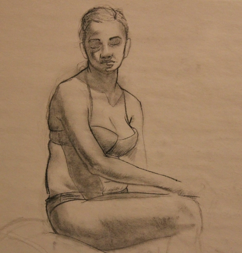 a figure drawing of a girl sitting